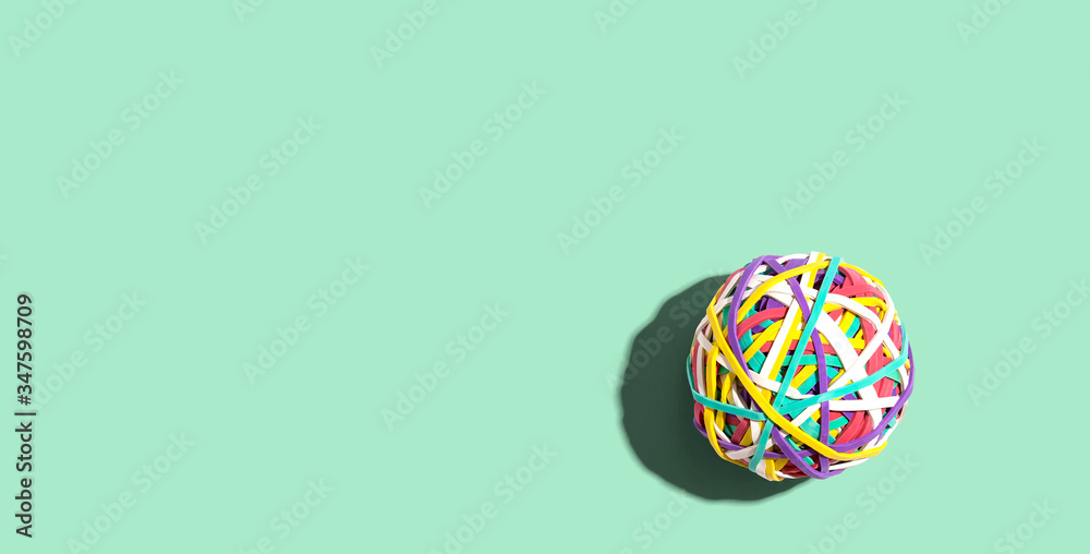 Elastic band ball with drop shadow overhead view - flat lay