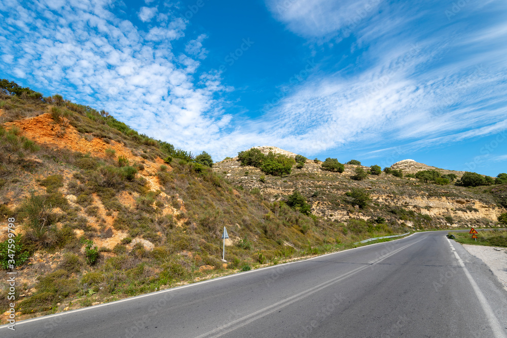 Asphalt road. Beautiful mountain landscape. Crete, Greece. Asphalt road. Beautiful mountain landscape. Crete, Greece.