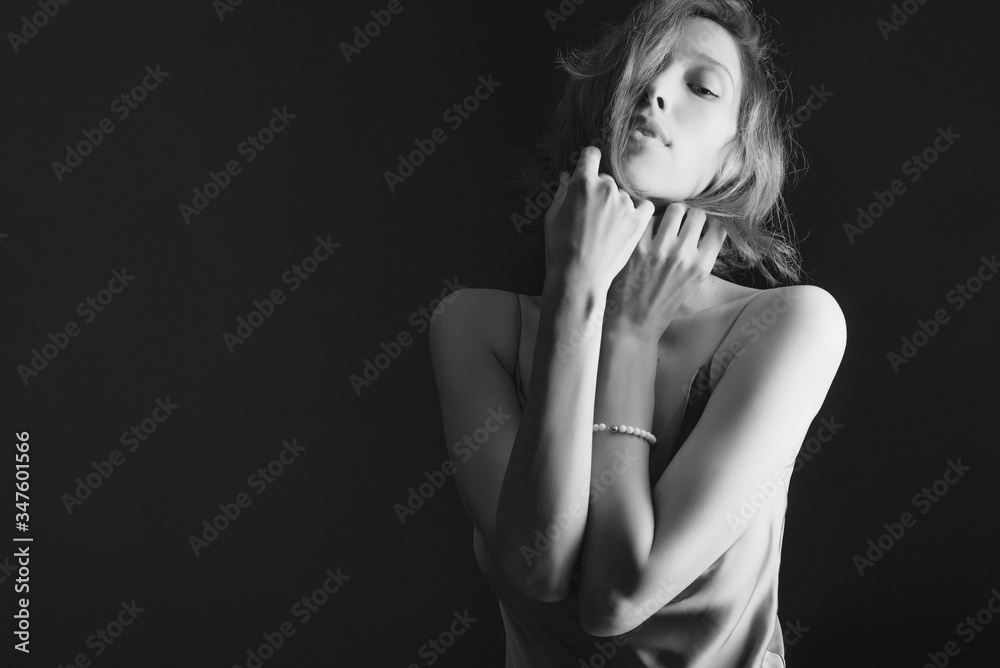 Portrait of a beautiful, sexy girl. Black and white art photo. The concept of beauty and youth Portrait of a beautiful, sexy girl. Black and white art photo. The concept of beauty and youth