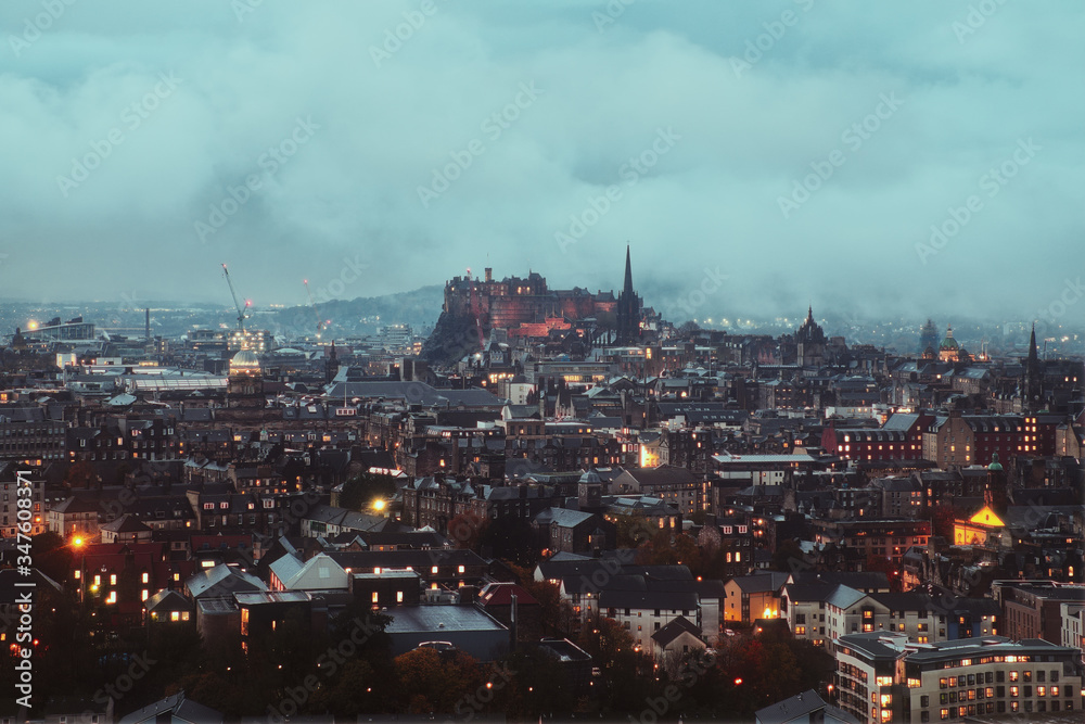 Top view of Edinburgh covered clouds and the Castle in the evening, Edinburgh, Scontald, United Kingdom