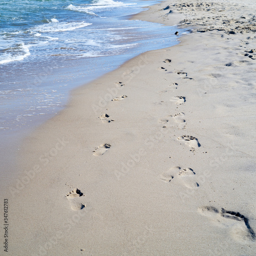Fototapeta Naklejka Na Ścianę i Meble -  Footprints on the beach of the Polish Baltic Sea coast near Rewal