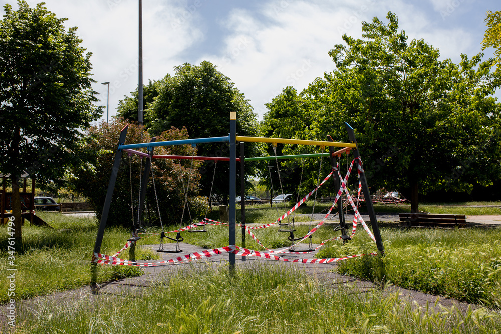 Park Closed With Warning Signal Red And White Ribbon Because Of Quarantine. Coronavirus Covid 19 pandemic period
Park Closed With Warning Signal Red And White Ribbon Because Of Quarantine. Coronavirus Covid 19 pandemic period