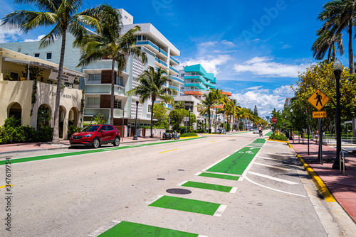 Miami, Ocean Drive. Urban city street in the south of Florida, USA. South Beach. US city mood. Bicycle path in a big city. Real Estate in Miami. Investment and property. photo