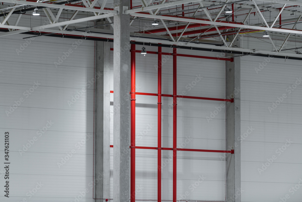 Fire suppresion system on empty clean industrial walls and cealing