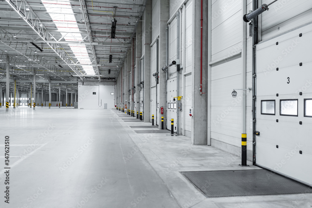Empty loading docks at the logistics center from inside