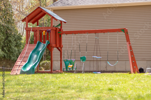 swingset or playground in a home backyard
