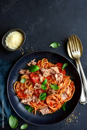 Pasta spaggeti with tuna and tomato sauce. Top view with copy space.