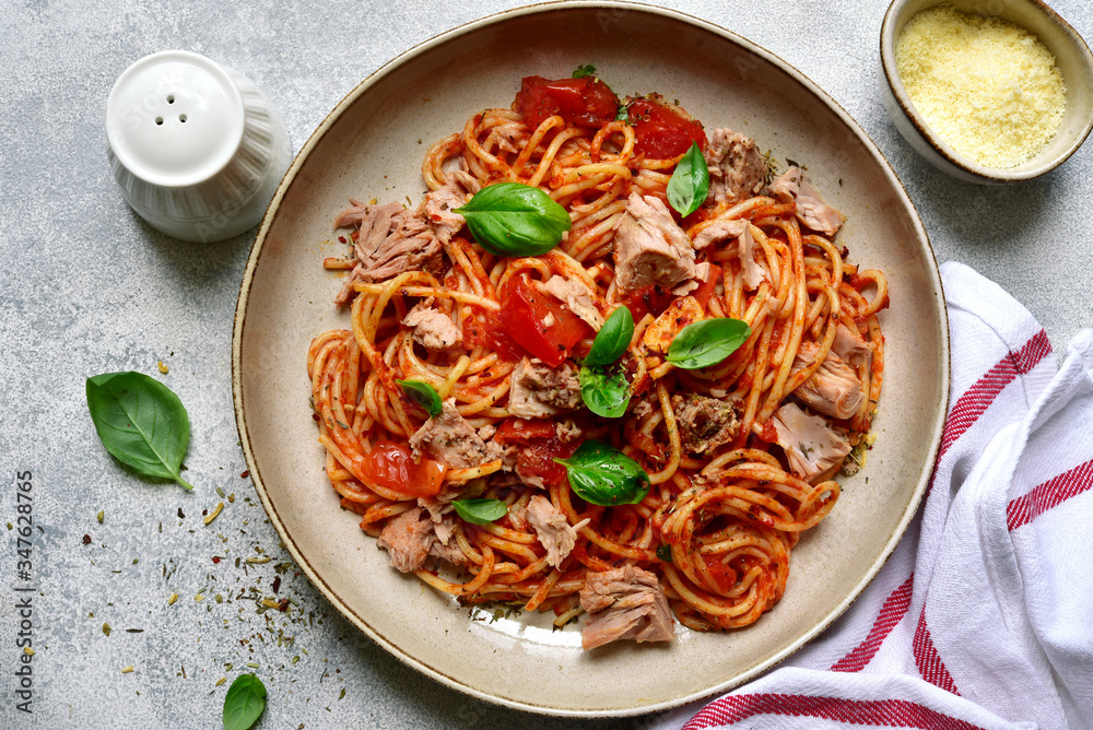 Pasta spaggeti with tuna and tomato sauce. Top view with copy space. Pasta spaggeti with tuna and tomato sauce. Top view with copy space.
