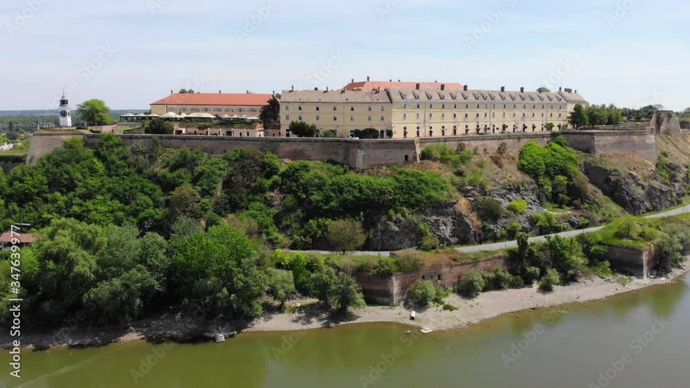 Aerial view of Petrovaradin Fortress located on the right bank of the Danube river in Novi Sad, Serbia. Drone video. Aerial view of Petrovaradin Fortress located on the right bank of the Danube river in Novi Sad, Serbia. Drone video.