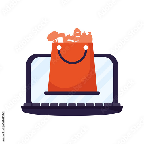 laptop computer with shopping bag