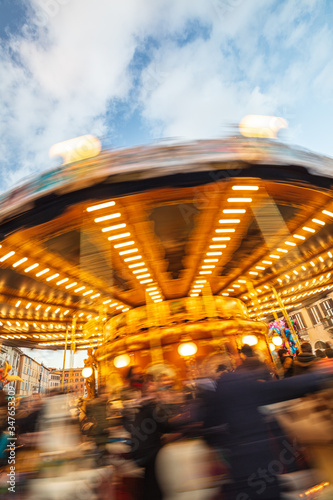 Ancient German Horse Carousel built in 1896 in Navona Square, Rome, Italy