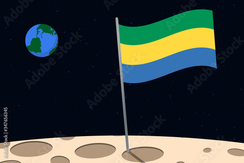 View of planet Earth from the surface of the Moon with the Gabon flag and holes on the ground