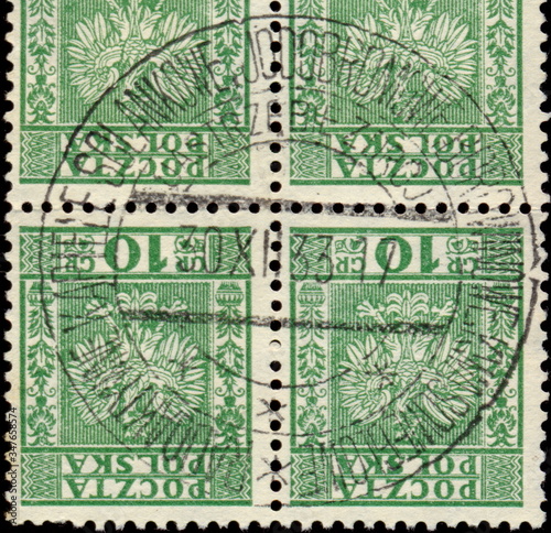 Jastrzębie Zdrój. Reklamowy kasownik / datownik pocztowy (1933) odbity na znaczkach pocztowych z godłem państwowym na tle prążkowanym między ornamentami roślinnymi (10 gr, Fi.252).
