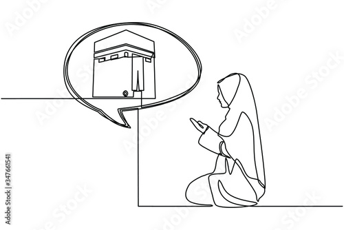 Continuous line drawing of Muslim woman praying for Allah facing the Kaaba raised his hand in prayer. The hands of Muslim women above pray by wearing traditional clothes isolated on white background.