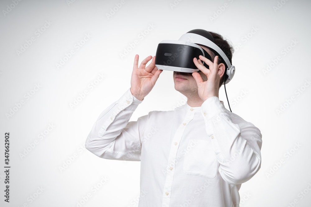 young man wearing vr glasses young man wearing vr glasses