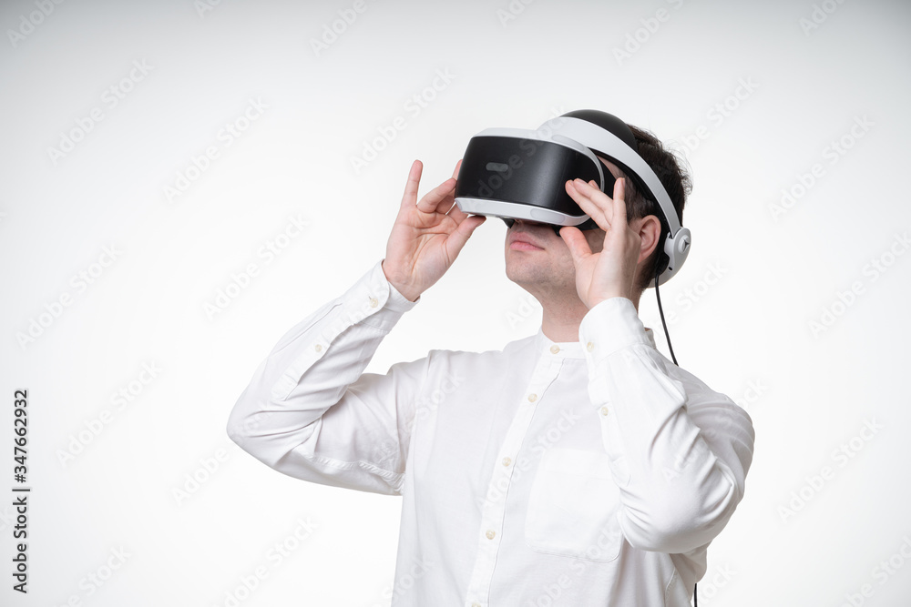 young man wearing vr glasses young man wearing vr glasses