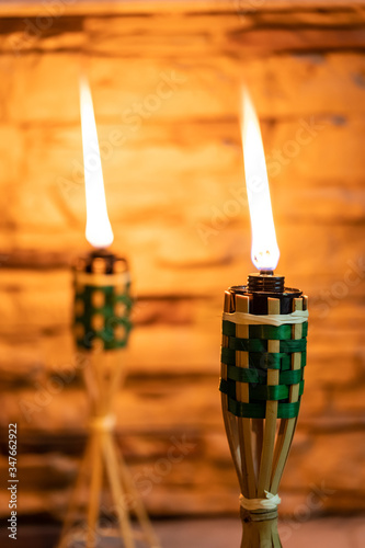 Bamboo oil lamp or pelita for eid or hari raya decoration photo