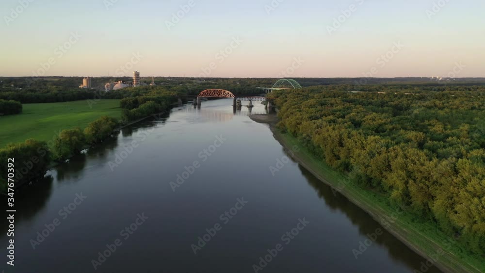 Arched Bridge and Wide River in Green Landscape, Long shot, Aerial Forward Dolly Arched Bridge and Wide River in Green Landscape, Long shot, Aerial Forward Dolly