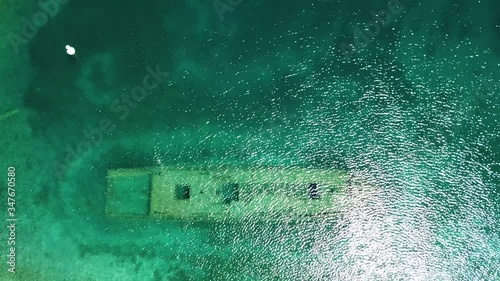 Submerged Shipwreck in Tobermory, Bruce Peninsula, Canada. Top Down Aerial View of Ship Wreckage From 19th Century in Lake Huron photo