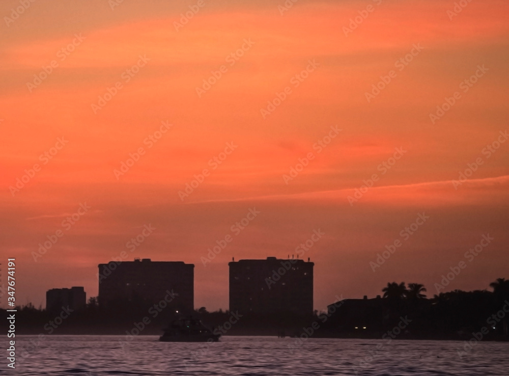sunset over the city, sky, skyline, silhouette, clouds, vibrant, colorful, red, urban, horizon, building