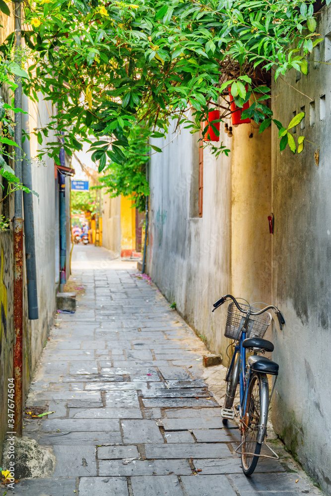 Bicycle parked near wall at Hoi An (Hoian), Vietnam