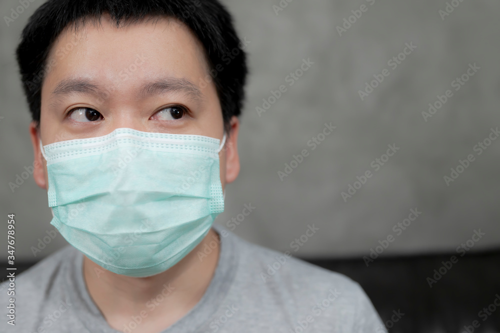 Man wearing hygienic mask to prevent infection, airborne respiratory illness such as flu, 2019-nCoV.Protection against contagious disease, coronavirus.