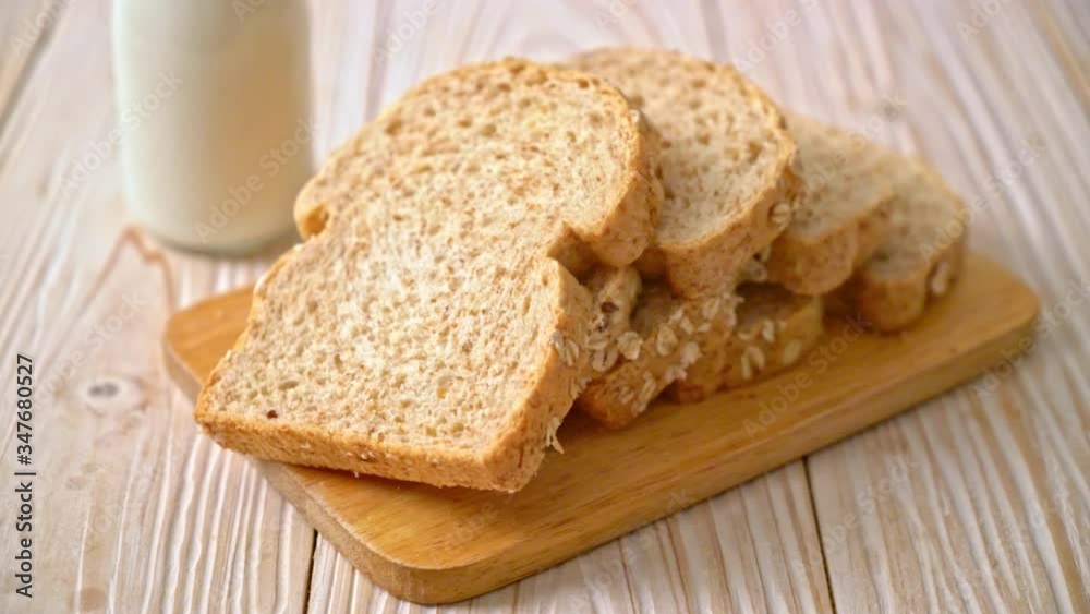 sliced wholegrain bread on a wooden table sliced wholegrain bread on a wooden table
