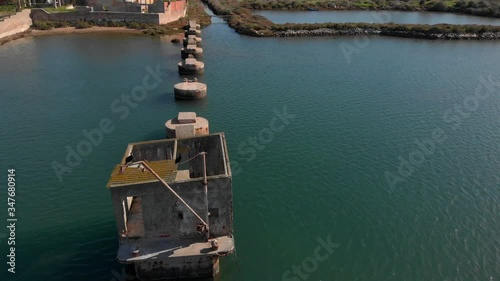 Abandoned construction on Arade river. photo