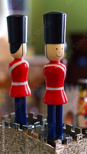 Grenadier guards wearing black hats and red jacket photo