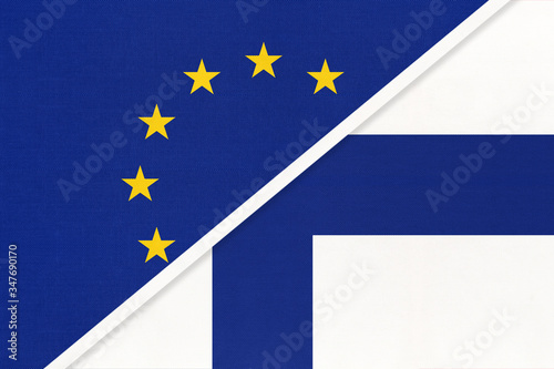 European Union or EU vs Finland national flag from textile. Symbol of the Council of Europe association.