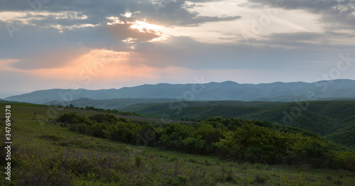  Panoramic view of sunrise in a beautiful green field. Kakheti  Georgia