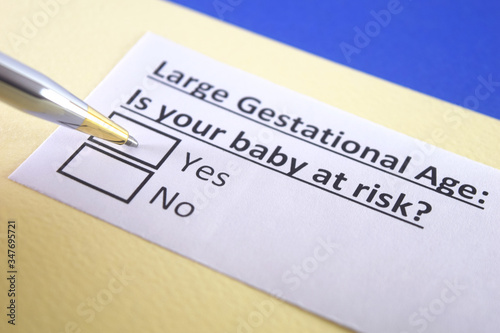 One person is answering question about large gestational age. photo