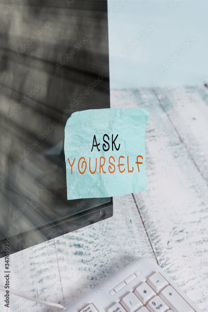 Text sign showing Ask Yourself. Business photo text Thinking the future Meaning and Purpose of Life Goals Notation paper taped to black computer monitor screen near white keyboard Text sign showing Ask Yourself. Business photo text Thinking the future Meaning and Purpose of Life Goals Notation paper taped to black computer monitor screen near white keyboard