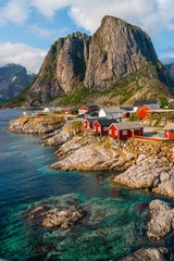 Papier peint photo Lofoten Hamnøy au pied des montagnes  © Maria Veronica/Wirestock