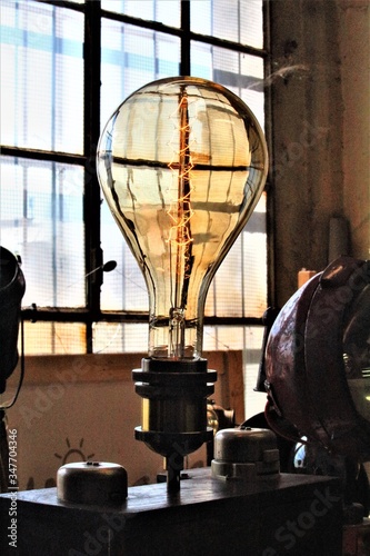 Milan, Italy, 2017.05.21 evocative image of large electric light bulb at a vintage market