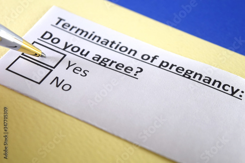 One person is answering question about termination of pregnancy.