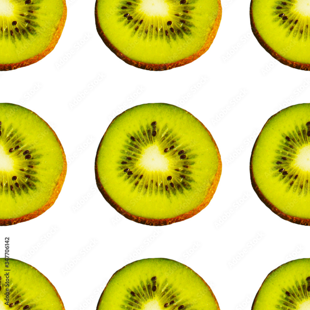 Fototapeta premium Seamless endless pattern of juicy green slices of kiwi fruit isolated on white background. Design for wrapping paper, fabric and wallpaper.