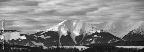 winter landscape with snowy mountains and fir trees