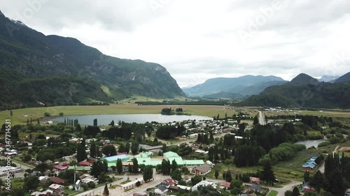 Villa Maniguales, Chile. Aerial View of Small City in Valley Under Andes Mountains photo