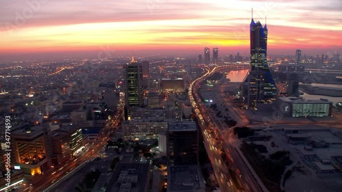 Timelapse - dusk to night aerial view of Manama, Bahrain