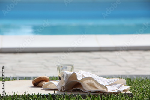 Breakfast by the pool with coffee and donuts. Relaxation and luxury for rest photo