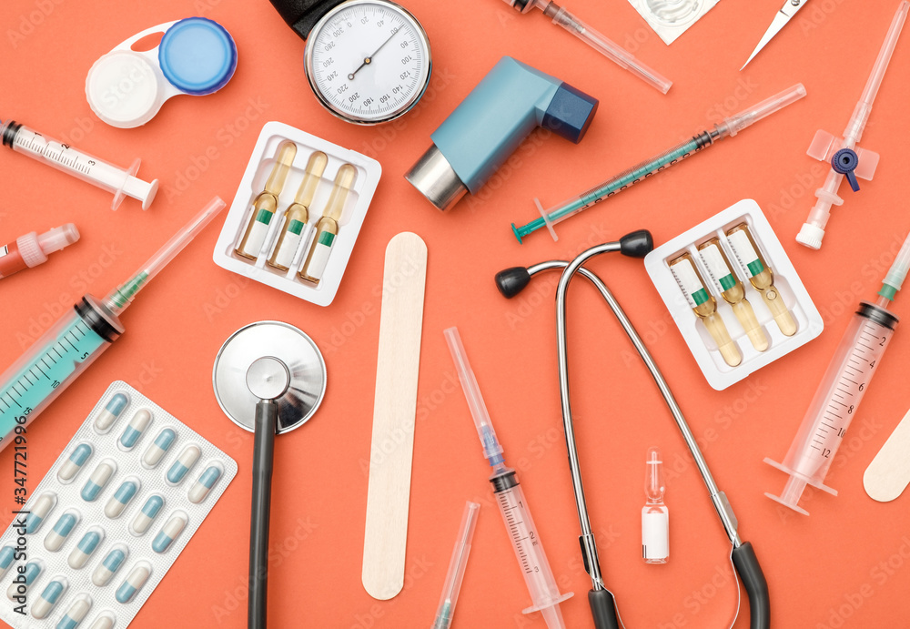 Flat lay of medical tools on colored background Flat lay of medical tools on colored background