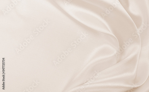  Smooth elegant golden silk or satin luxury cloth texture as wedding background. Luxurious background design. In Sepia toned. Retro style