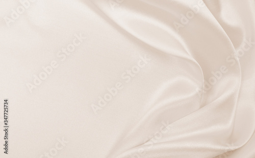  Smooth elegant golden silk or satin luxury cloth texture as wedding background. Luxurious background design. In Sepia toned. Retro style