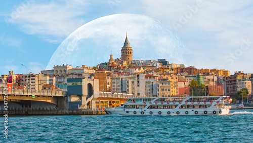 Galata Tower, Galata Bridge, Karakoy district and Golden Horn with full moon - istanbul, Turkey "Elements of this image furnished by NASA"