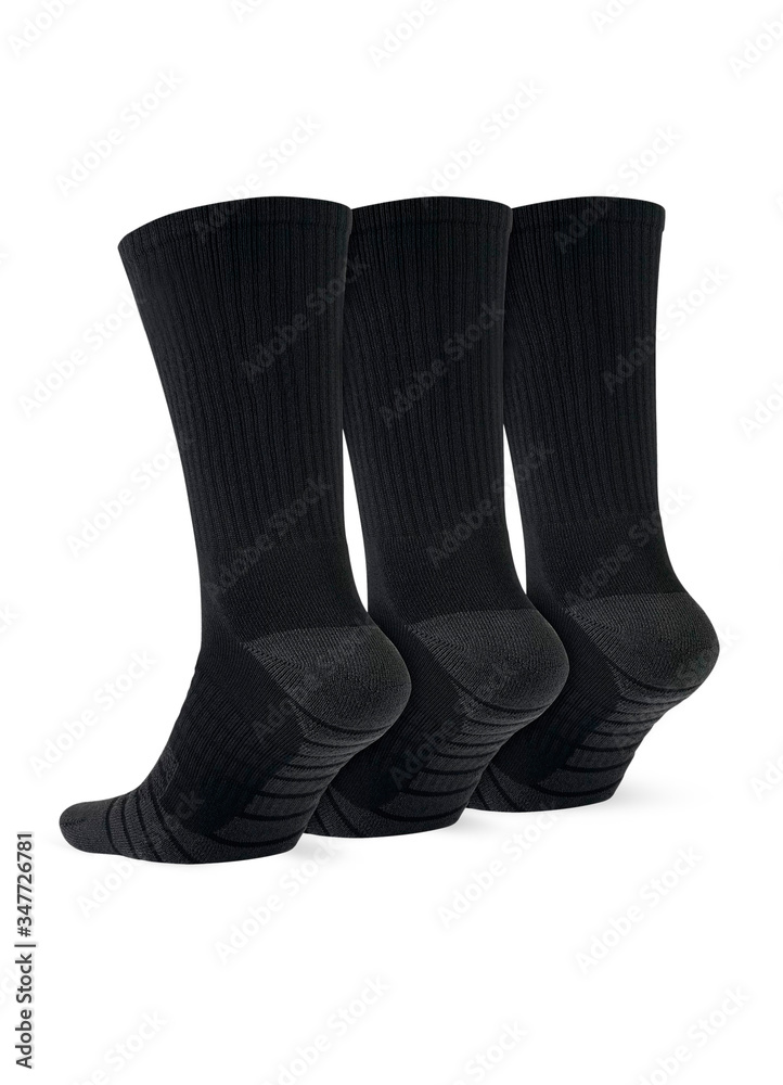 Black color socks isolated on white background. One pair of socks. Set of black socks for sports on foot as mock up for advertising, branding, design mockup, isolated, clipping path. Black color socks isolated on white background. One pair of socks. Set of black socks for sports on foot as mock up for advertising, branding, design mockup, isolated, clipping path.