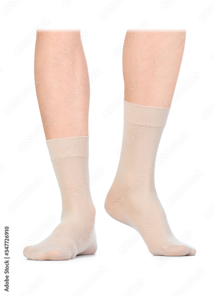 Beige color short mini socks mockup for design isolated on white background. skin colored set of short socks for sports as mock up and label for advertising, logo, branding.