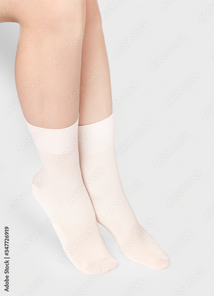 Blank white socks design mockup, isolated, clipping path. Pair sport crew cotton sock wear mock up. Long clear soft cloth stand presentation. Men basketball, football, tennis plain apparel template. Blank white socks design mockup, isolated, clipping path. Pair sport crew cotton sock wear mock up. Long clear soft cloth stand presentation. Men basketball, football, tennis plain apparel template.