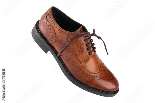 Classic brown men's oxfords shoes, with Derby type lacing, isolated on a white background, casual shoes for office © OlegKovalevich