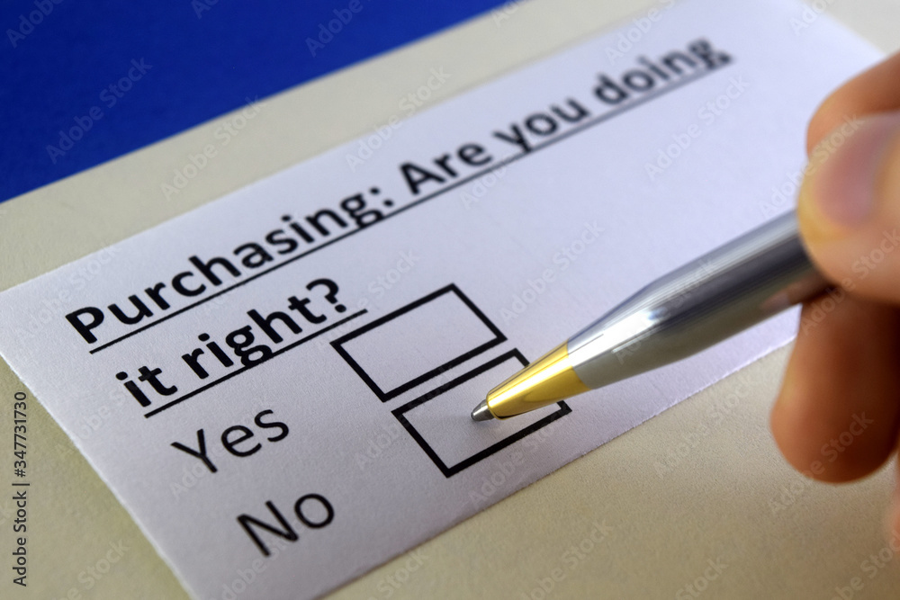 One person is answering question about purchasing. One person is answering question about purchasing.